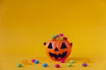 Halloween Jack O Lantern Bucket Filled With Candies Stock Photo