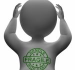 Fragile Stamp On Man Showing Breakable Or Delicate Stock Photo