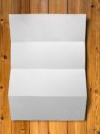 White Crumpled Paper On Wood Stock Photo
