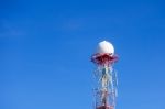 Radar Dome In The Sea With Blue Sky And Clouds Stock Photo