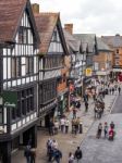 People Shopping In Chester City Centre Stock Photo