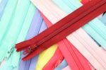Pile Of Multiple Color Zippers Stock Photo