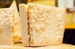 Piece Of Grana Padano Or Parmigiano Reggiano Aka Parmesan Cheese Stock Photo