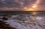 Sun Setting At Quarteira In Portugal Stock Photo