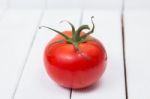 Tasty Tomato On A White Background Stock Photo