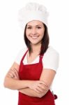 Cheerful Confident Young Female Chef Stock Photo