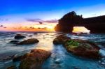 Tanah Lot Temple At Sunset In Bali, Indonesia.(dark) Stock Photo