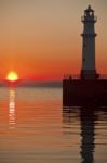 Lighthouse At Sunset Stock Photo