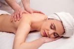 Young Woman Is Having A Massage Stock Photo