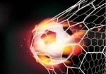 Soccer Ball In Goal Net On Fire Flames Stock Photo