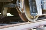 Old Rusty Wheels Of A Train And The Railway Stock Photo