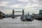 View Of Tower Bridge And The Pool Of London With Two Warships Stock Photo