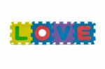 Word Love Formed With Colorful Foam Puzzle Toy Isolated On White Stock Photo
