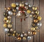 Christmas Wreath Over Wood Background Stock Photo