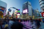 Tokyo - November 28, 2013: Pedestrians At The Famed Crossing Of Stock Photo