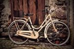 Italian Old-style Yellow Bicycle Stock Photo