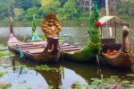 Traditional Khmer Boats With Carved Bows Stock Photo