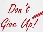 Dont Give Up! On Whiteboard Means Encouragement And Motivation Stock Photo
