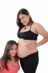Beautiful Pregnant Woman With Her Daughter Stock Photo