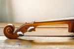 The Violin On The Table Stock Photo