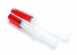 Syringe With Red Liquid Isolated On White Background Stock Photo