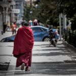 Shangri-la, China - April 20, 2016:lama Are Walking In The City Stock Photo