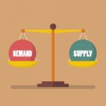 Demand And Supply Ball Balance On The Scale Stock Photo