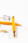 Broken Pencil With Metal Sharpener And Shavings Stock Photo