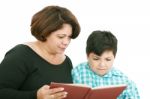 Mother And Son Reading A Book  Stock Photo