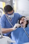 Dentist At Work Stock Photo