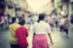 Blurred People Walking On The Street Of Old Town Stock Photo