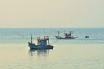 Fisherman Boat In Sea Stock Photo
