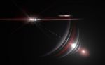 Lens Flare Or Star Flare In Black Background.modern Nature Flare Effect With Black Background For Overlay Design Stock Photo