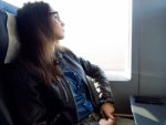 Beautiful Young Woman Travelling By Train Stock Photo