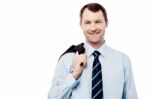 Bussiness Man With Coat On Shoulder Stock Photo