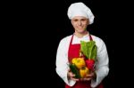 Handsome Chef Holding Vegetables Bowl Stock Photo
