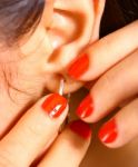 Girl Wearing Ear Rings Stock Photo