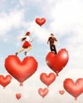 Couple Jumping Or Running On Red Heart Balloons,3d Illustration Stock Photo