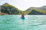 Travel By Boat With A Kayak Stock Photo