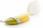 Banana And Measuring Tape Stock Photo