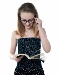 Beautiful Girl reading Book Stock Photo