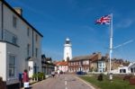 Union Jack Flag Flying Near The Lighthouse In Southwold Stock Photo