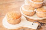 Homemade Banana Muffins On Wooden Plate Stock Photo