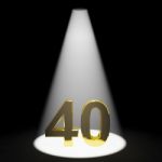 Golden Number 40 With Spotlit Stock Photo