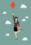 Business Woman Flying With Red Balloon Stock Photo