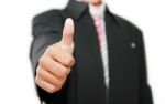 Business Man With Thumb Up Stock Photo