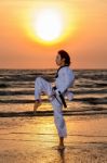 Martial Art Training At Sunset Stock Photo