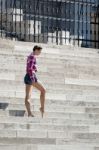 Ballerina Posing On The Steps Of The Hungarian Parlaiament Build Stock Photo