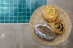 Assorted Pastry On Rattan Tray Stock Photo