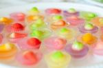 Fruit Shaped Mung Beans In Jelly Close Up In White Foam Dish, Wun Look Choup Thai Sweets Stock Photo